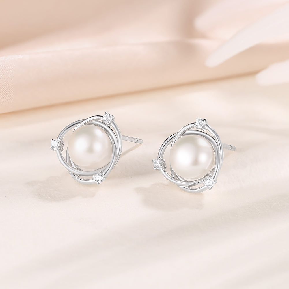 Boucles d'Oreilles Torsadées avec Perle en Argent